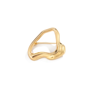 Golden irregular liquid lava metal brooch with hollow asymmetric fluid design on white background