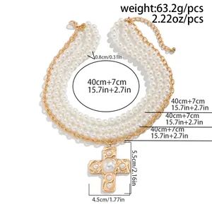 Detailed size chart of layered gold necklace with pearl cross pendant and dimensions