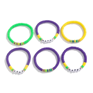 Detail of 6-piece Mardi Gras beaded bracelet set with colorful Heishi clay and letter beads