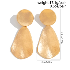 Detail of hammered gold drop earrings showing dimensions 6.5cm length and weight 17.1g