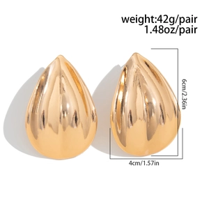 Detail of irregular drop earrings showing dimensions of 6cm length and 4cm width