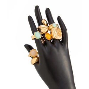 Detailed view of vintage gold alloy rings set featuring colorful acrylic stones and organic shapes