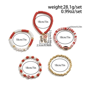 Detailed view of bohemian clay bead bracelets with football charms and LOVE lettering