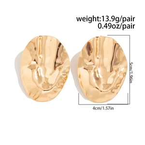 Detail of irregular textured gold oval earrings showing dimensions 5cm by 4cm and 13.9g weight