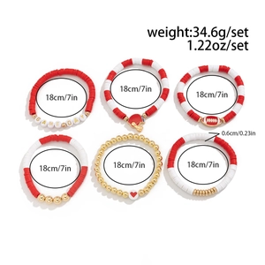 Close-up of 6-piece Super Bowl bracelet set with red clay beads and football charms