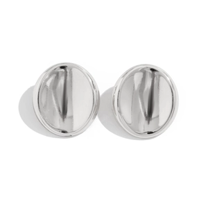 Macro shot of silver textured irregular earrings with high-gloss mirror polished finish