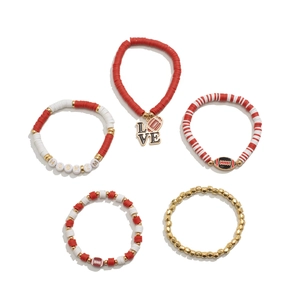 Macro shot of 5-piece red and white football themed heishi bead bracelets with golden accents