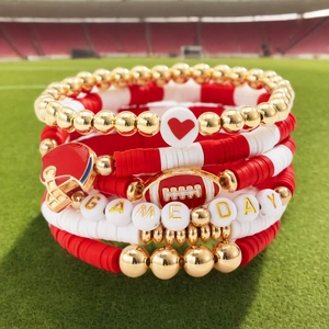 Five-piece red and white beaded bracelet set with game day lettering and helmet charm