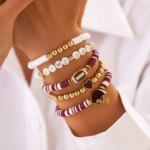 Detail of five-piece Game Day football themed beaded bracelet set with rugby charms