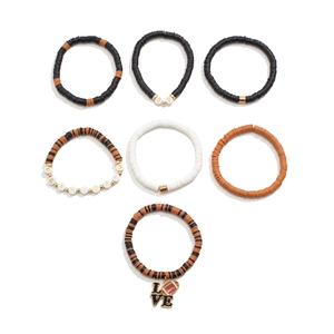 Detail view of 7-piece Game Day football bracelet set with beads and charms