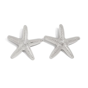 Detailed view of silver starfish earrings with realistic textured surface for beach style