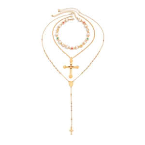 Gouden kruis hanger ketting en parel armband set met gekleurde strass steentjes op witte basis