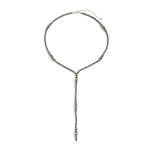 Detail view of retro Y-shaped long necklace with dark silver beads and adjustable clasp