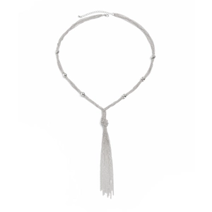 Detail of silver layered necklace showing metal beads and lobster clasp closure