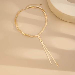 Detail of gold snake chain necklace with double-strand twisted Y-lariat fringe and lobster clasp