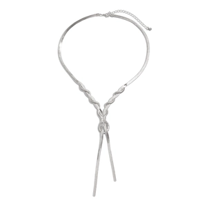 Detail of silver Y-shaped snake chain necklace featuring a twisted knot and lobster clasp