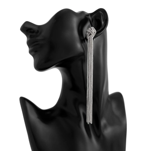 Silver tassel earrings with woven knot top and multi-layer chain drops on black model