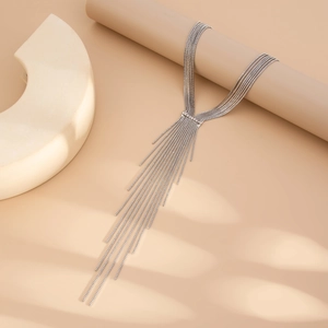 Detailed view of silver Y-shaped layered tassel necklace with multi-strand metallic chains