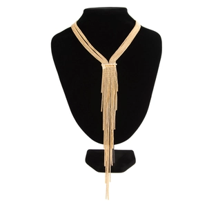 Close-up of golden multi-layer Y-shaped tassel necklace on a black jewelry display