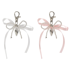 Porte-clés avec nœud ruban et pendentif cœur argenté en rose et blanc élégant