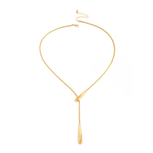 Detail of golden snake chain necklace featuring a smooth teardrop pendant and lobster clasp