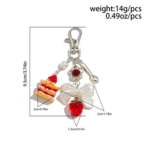 Détails du porte-clés fraise mignon avec les dimensions et spécifications de poids