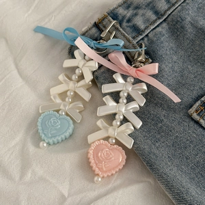 Pink and blue ribbon bow keychain with imitation pearls and embossed heart pendant