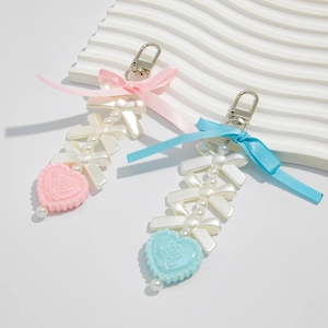 Sweet ribbon bow keychain with heart pendant and pearl beads in pink and blue