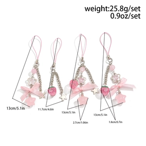 Pink strawberry and star phone charms set with measurements in cm and grams