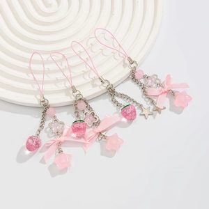 Pink strawberry bow and star charms set on a white platform, 4-piece cute accessory