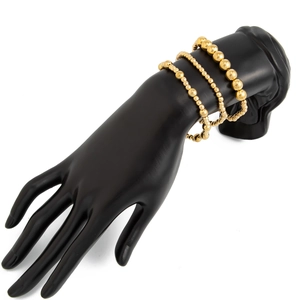 Dreiteiliges goldenes Perlenarmband-Set mit spiegelnden Metallkugeln in verschiedenen Größen