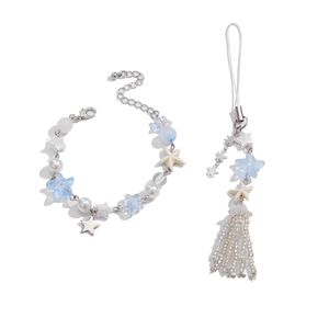 Starfish ocean bracelet set with faux pearls and blue beads on white background