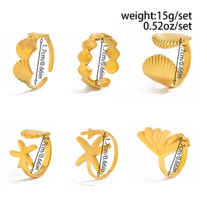 Detailed view of 6-piece gold starfish and seashell rings with size and weight specs