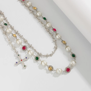 Baroque style necklace with colorful rhinestones, faux pearls and a crystal cross pendant