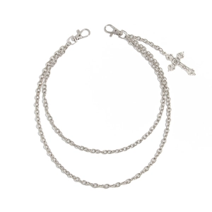 Close-up of double-layer silver metal waist chain featuring a vintage cross pendant