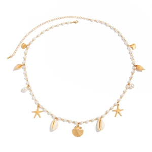 Summer beach body chain with pearls, golden starfish and seashell pendants for women