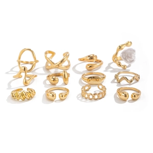 12-piece gold ring set with minimalist irregular designs and white rose detail