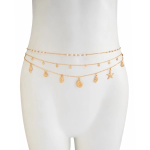 Detail of layered gold body chain with faux pearls and sea shells on white mannequin