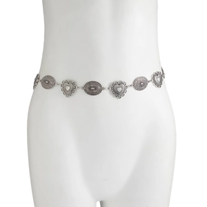 Detail view of Bohemian silver metal waist chain with sunburst and heart pendants