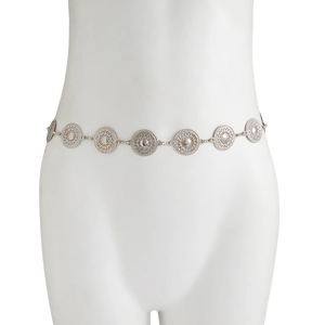 Close-up of silver boho waist chain showing detailed metal floral medallions on a model