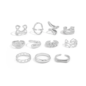 Detailed set of eleven silver lava rings showing mixed metal textures and chain patterns