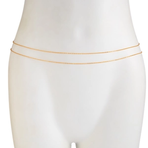 Detailed view of elegant double-layered gold body chain on a white display mannequin