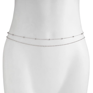 Detail of silver double-layered belly chain with beads on a minimalist white model