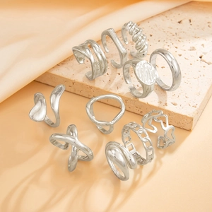 9-piece set of silver liquid lava metal rings with irregular geometric wave patterns