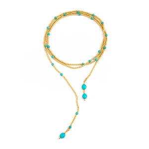 Detail van Boheemse Y-vormige ketting met gouden kralen en turquoise druppels