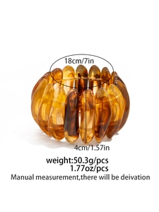 Detailed view of amber resin stretch bracelet showing dimensions 18cm length and 4cm width