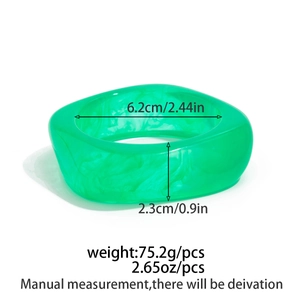 Detail of green resin bangle showing dimensions 6.2cm inner diameter and 2.3cm height