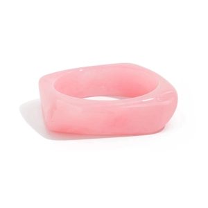 Detail shot of the translucent pink chunky resin ring with soft marble texture
