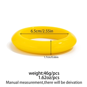 Afmetingen van gele hars armband met 6,5cm binnendiameter en een breedte van 1,7cm