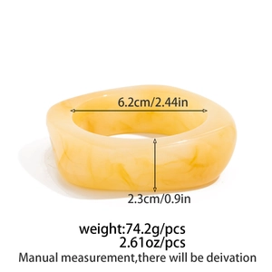 Detailed dimensions of yellow marble resin bangle with 6.2cm inner diameter and 2.3cm width